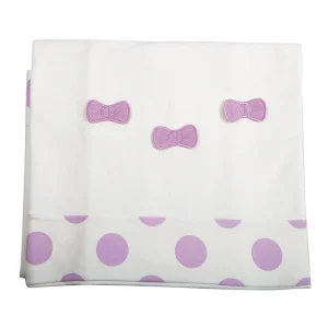 Copertina in in felpa garzata con inserto a pois e fiocchi applicati